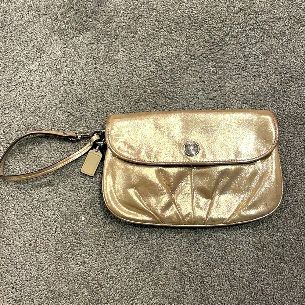 Coach metallic gold wristlet